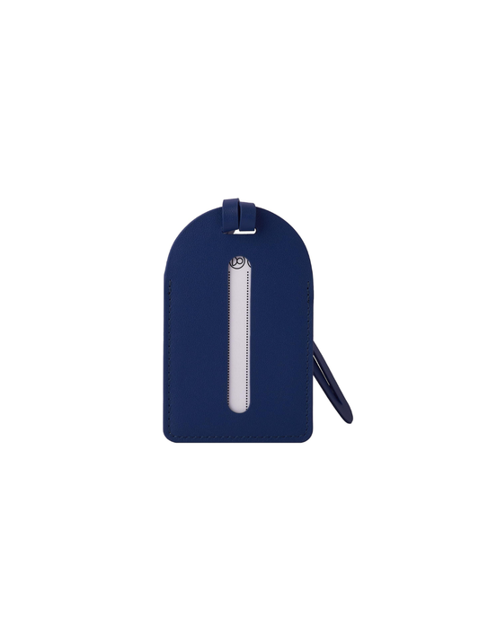 A navy blue leather luggage tag with a vertical silver zipper and a matching wristlet strap, shown on a plain white background.