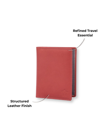 A reddish-brown leather wallet against a solid pale pink background.