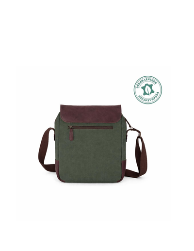 A green canvas crossbody bag with dark brown leather trim and a matching adjustable shoulder strap, shown on a plain white background with a green leather certification badge in the upper right.