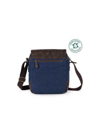 A navy blue canvas crossbody bag with dark brown leather trim and a front zip pocket, shown on a plain white background with a blue 'Genuine Leather' certification badge in the upper right.