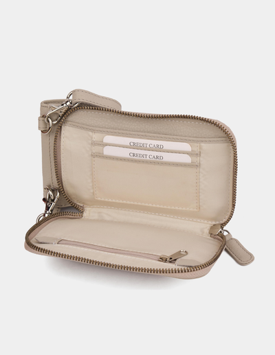 An open beige leather zip-around wallet with a wristlet strap, showing interior card slots, a cash compartment, and a zippered pocket on a light gray background.