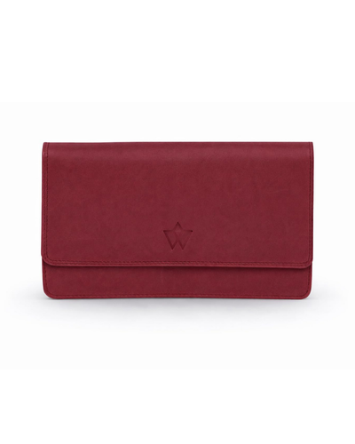 A dark red leather clutch wallet with a small debossed star logo on the front, shown against a plain white background.