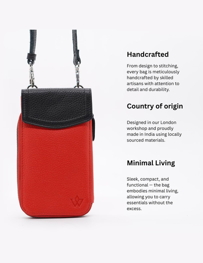 A red and black leather crossbody phone pouch shown on a light gray background with descriptive text on the right side. The text highlights handcrafted details, country of origin in India, and a minimalist living aesthetic.