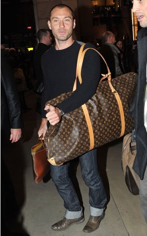 Jude Law with Leather as a Travel Essential 